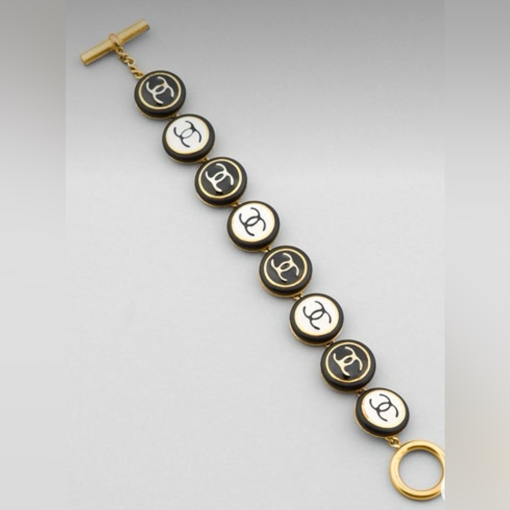 CHANEL Gold-Tone Bracelet with Black and White CC Discs